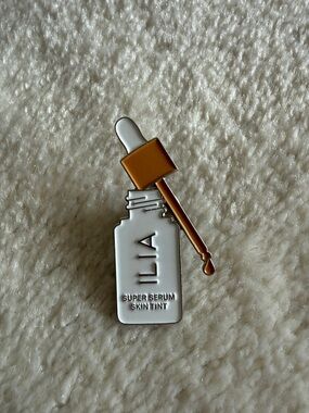 Ilia Serum Foundation shaped Pin